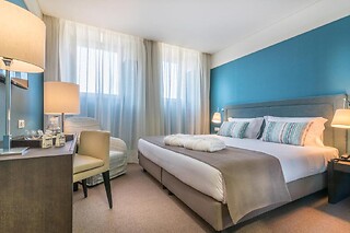 Uma noite em quarto duplo com pequeno-almoço para 2 | Universal Boutique Hotel (Figueira da Foz)